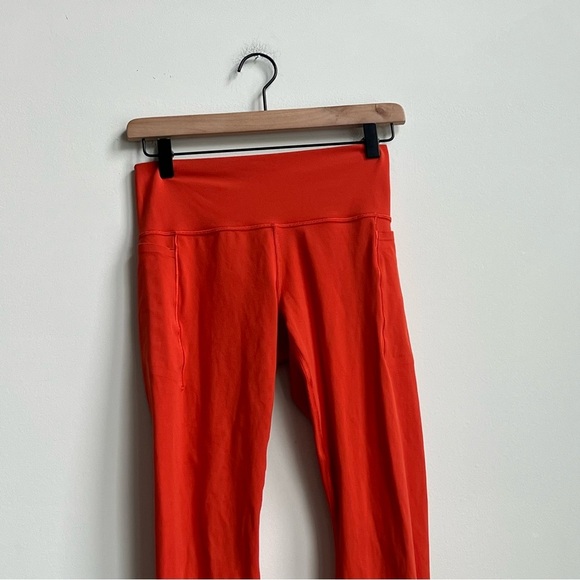 Athleta Transcend Stash Tight with Pockets Larkspur Red (orange) medium leggings - Picture 6 of 14